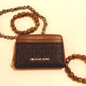 Michael Kors Monogram Jet Set medium zip around wallet.Pristine Condition.Clean.